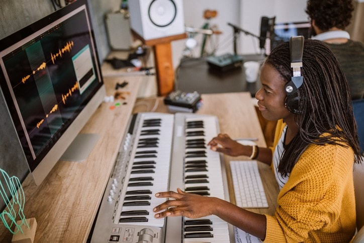 Couple making music in studio