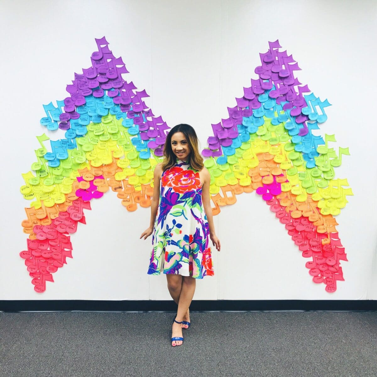 music teacher with music note rainbow wings