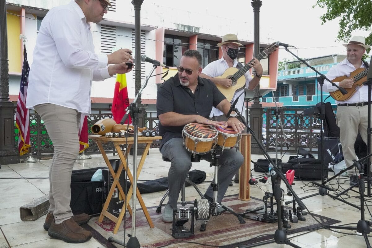 Sec Miguel Cardona playing bombas