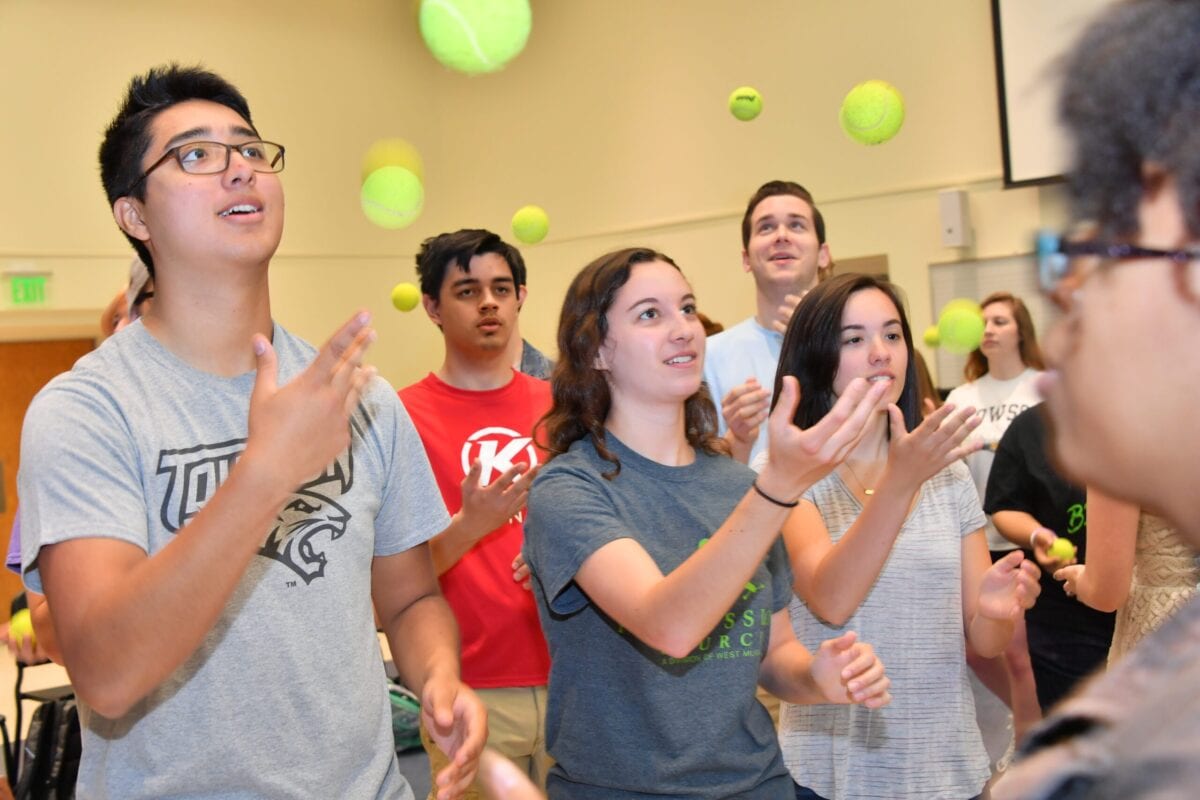 NAFME students juggling tennis balls