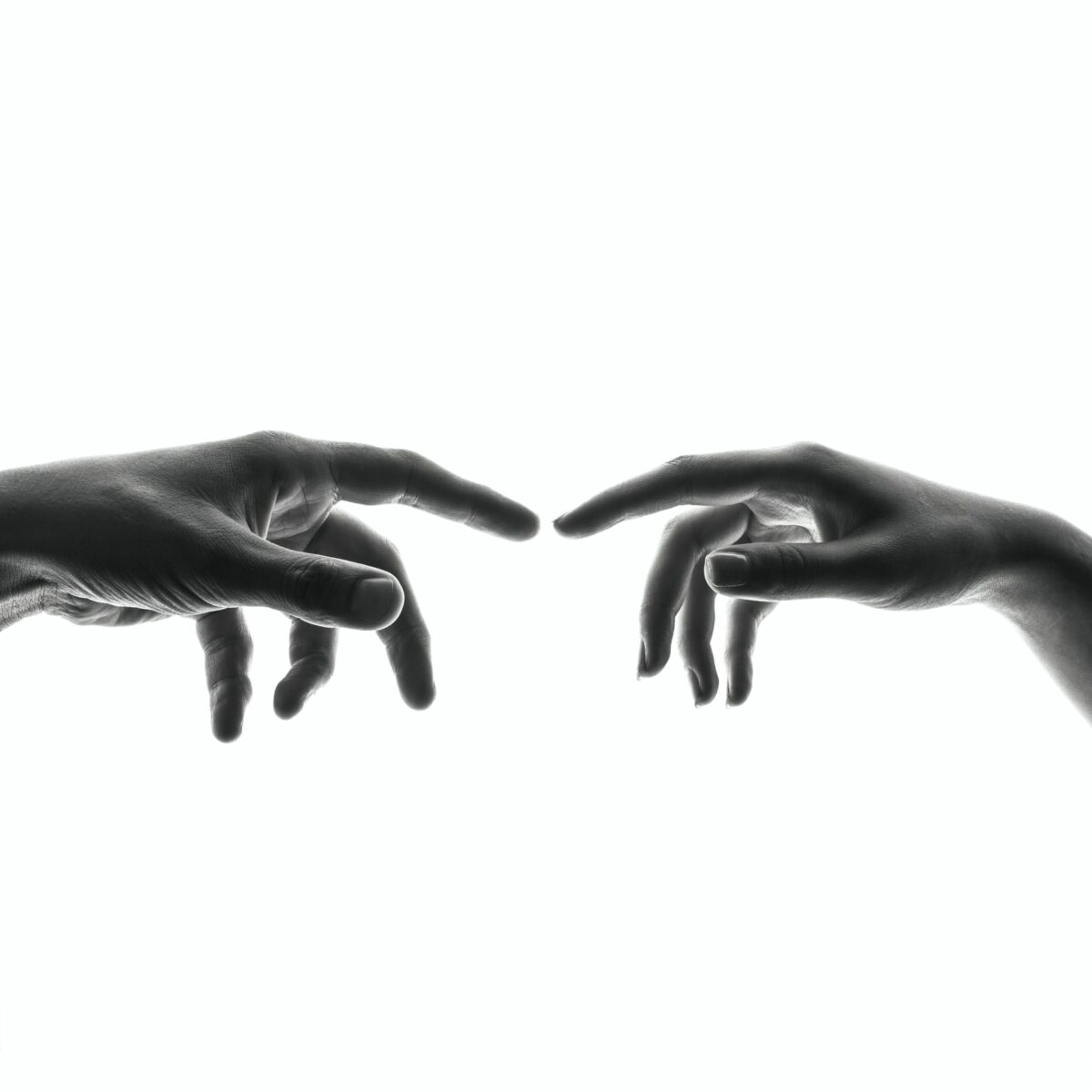 fingers touching illustrating connection and presence