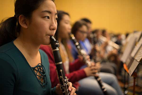 NAfME students playing flute