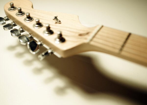 close up photo of an acoustic guitar