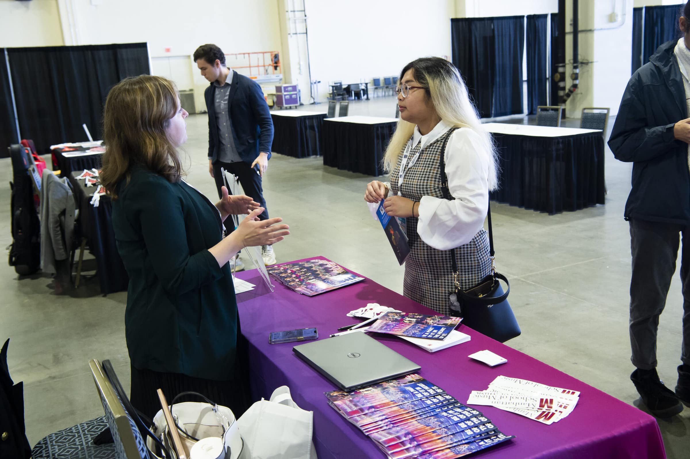 student at college fair