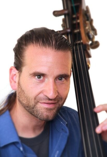 Jason Heath headshot with double bass 