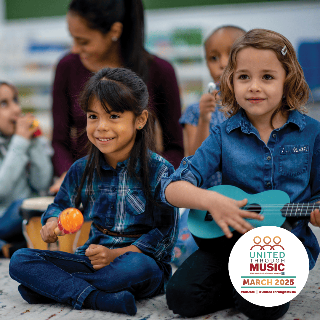 Children play instruments in music class