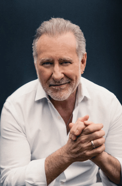 Brian Bromberg headshot wearing white shirt
