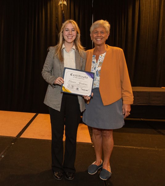 2025 Shannon Kelly Kane scholarship presentation to Amari Junkins by NAfME President Deb Confredo.