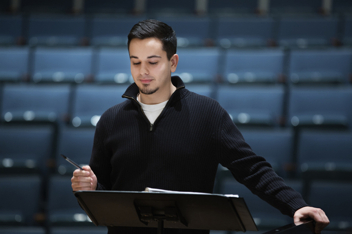 music conductor at podium