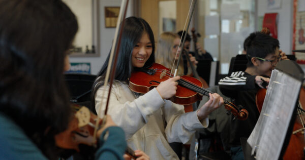orchestra students in class
