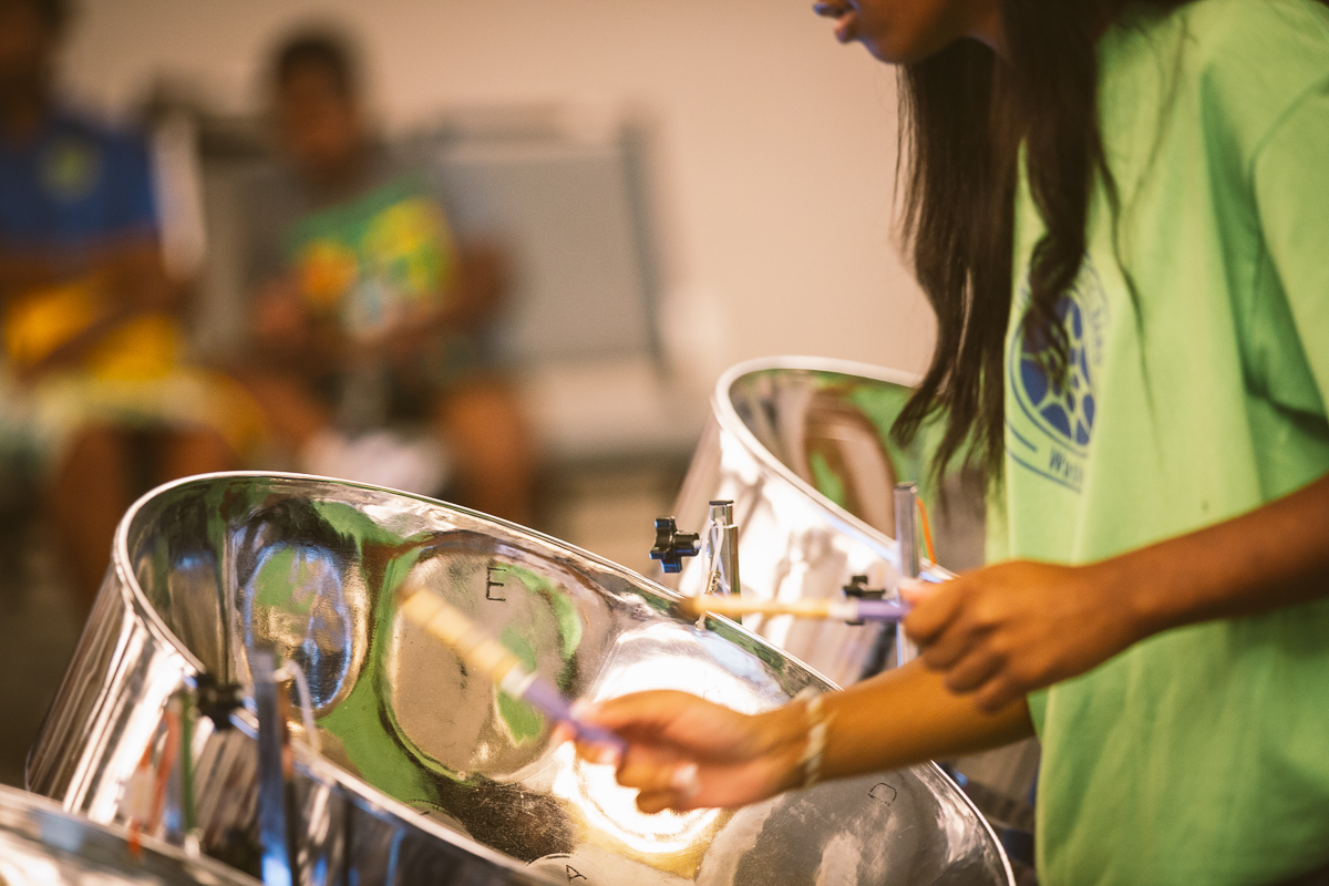 closeup of student playing the steel drums