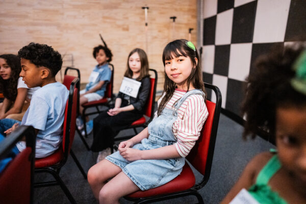 seated students waiting to audition