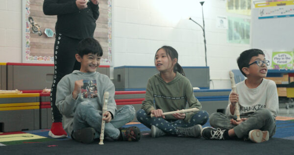 elementary music students with recorders