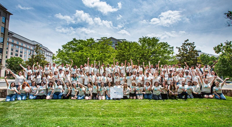 Group photo of 101 college students outside at the Collegiate Leadership Advocacy Summit