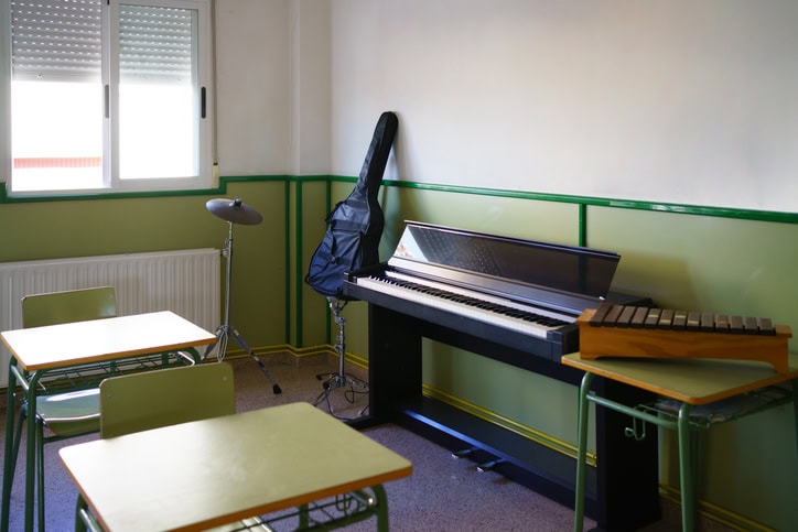 Some instruments in an empty school music classroom