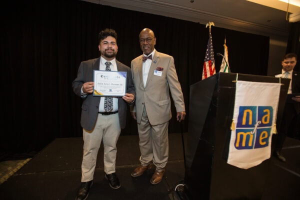 NAfME President Cecil Adderley with Felix Moreno holding the Shannon Kelly Kane scholarship certificate
