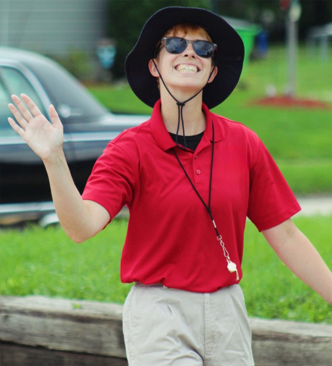 Joss Bowling candid photo waving and smiling