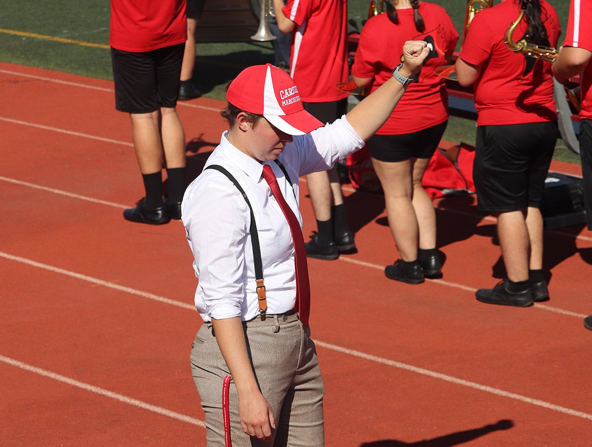 Joss Bowling directing their marching band