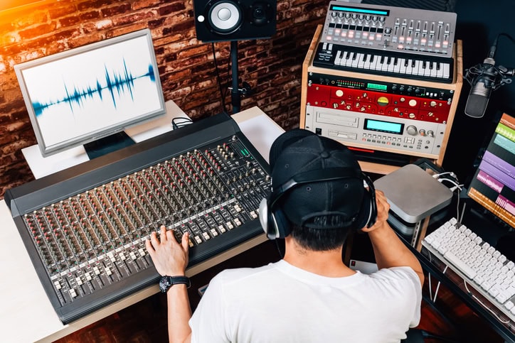 music producer, sound engineer, composer, dj working in studio. recording, broadcasting, audio video editing concept