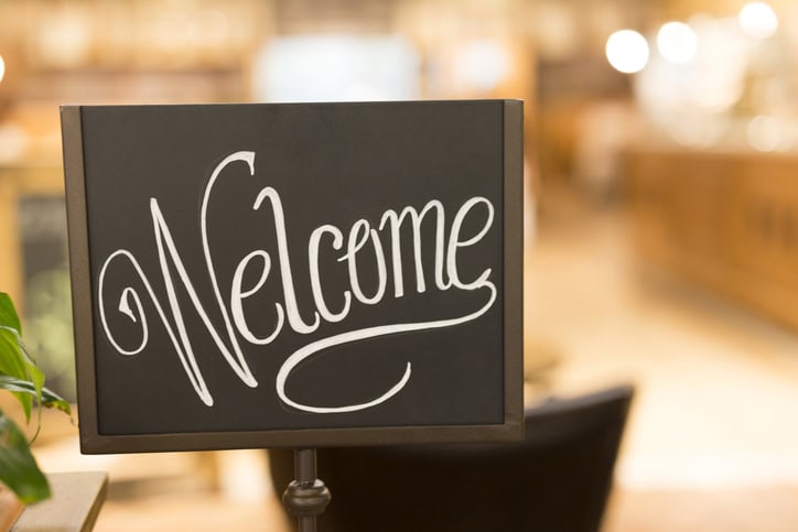 Welcome Sign in brightly lit room