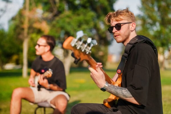 Guitar players performing outdoors